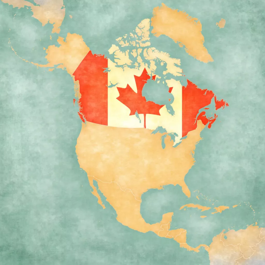 How do climate and geography influence life in Canada for immigrants?